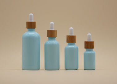 Coloree las botellas de aceite esencial del azul de cielo de la capa 15ml 30ml con el dropper de bambú