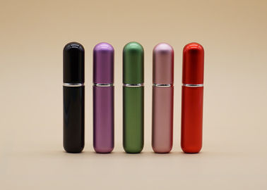 El pequeño espray de perfume recargable cosmético embotella la forma del cilindro respetuosa del medio ambiente