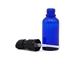 El dropper de cristal embotella color azul transparente de las botellas de aceite esencial