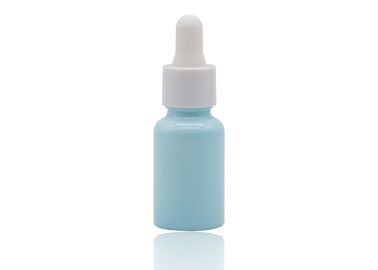 El color azulado que cubre el dropper del aceite esencial embotella la botella de cerámica blanca 30ml