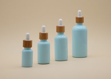 Botellas de cristal azules del aceite esencial del color de las muestras libres con el dropper de bambú