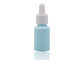El color azulado que cubre el dropper del aceite esencial embotella la botella de cerámica blanca 30ml
