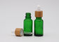 Botellas de cristal cosméticas verdes del dropper del aceite 18m m con la pipeta de bambú de la impresión del dropper